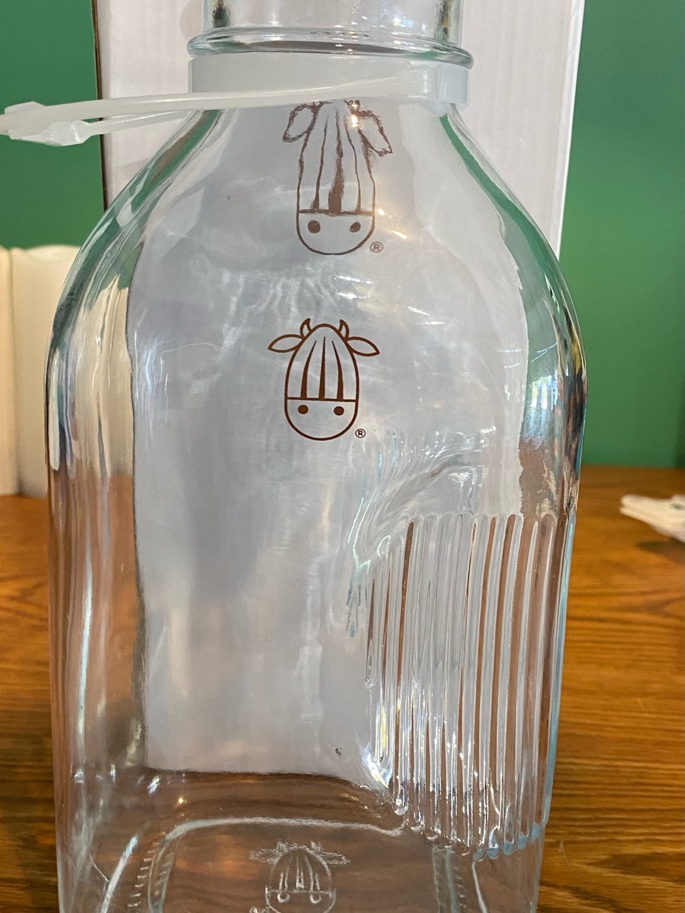 Clear Glass Bottle with Brown Cow Logo - Home Dining Drinkware